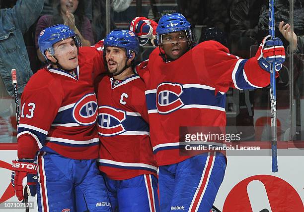 Mike Cammalleri, Brian Gionta P.K. Subban of the Montreal Canadiens celebrates a goal during the NHL game against the Philadelphia Flyers on November...
