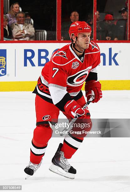 Ian White of the Carolina Hurricanes skates to a defensive position on the ice during a NHL game against the Nashville Predators on November 20, 2010...