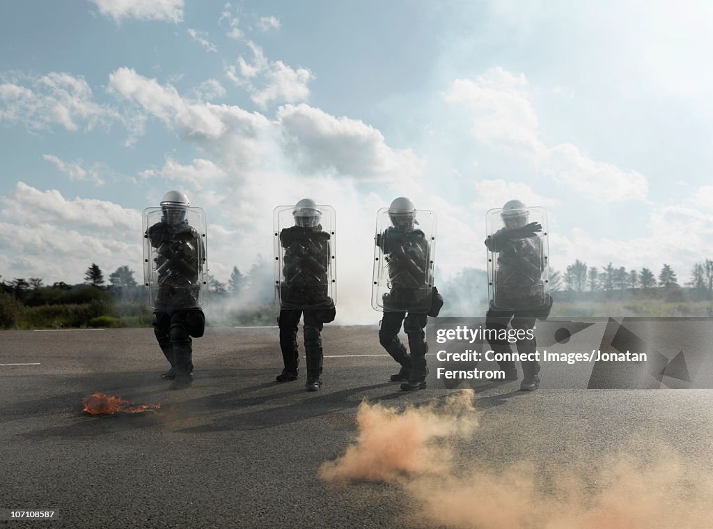 Policemen with shields