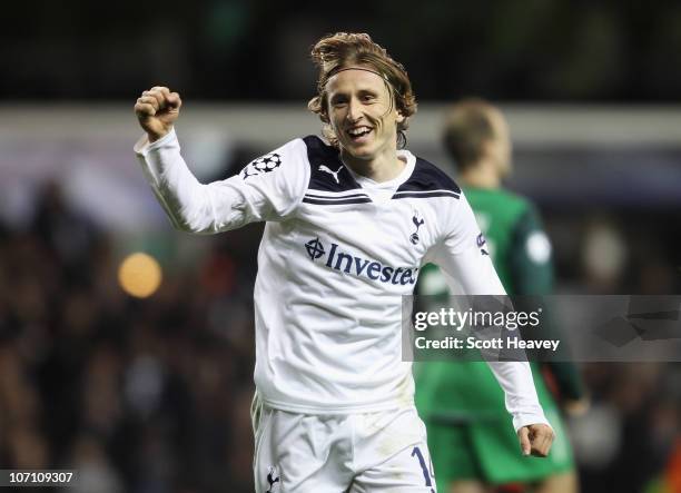 Luka Modric of Tottenham Hotspur celebrates scoring Tottenham's second goal during the UEFA Champions League Group A match between Tottenham Hotspur...