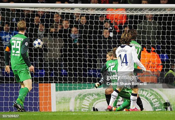 Luka Modric of Tottenham Hotspur hits the back of the net to score Tottenham's second goal during the UEFA Champions League Group A match between...