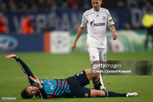 Yoann Gourcuff of Lyon lies injured on the pitch during the UEFA Champions League group B match between FC Schalke 04 and Olympique Lyonnais at...