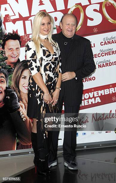 Loredana De Nardis and Massimo Boldi attend the "A Natale Mi Sposo" photocall at Cinema Adriano on November 24, 2010 in Rome, Italy.