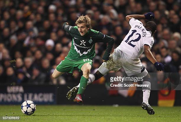 Marko Marin of Werder Bremen evades a challenge by Wilson Palacios of Tottenham Hotspur during the UEFA Champions League Group A match between...