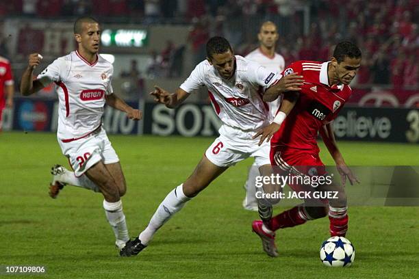 Benfica'sforward Alan Kardec challenges Hapoel Tel Aviv's defender Bevan Fransman during their UEFA Champions League group B football match at...