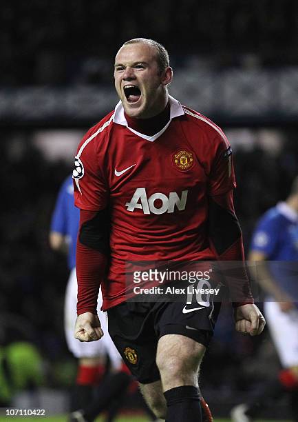 Wayne Rooney of Manchester United celebrates after scoring the winning goal from the penalty spot during the UEFA Champions League Group C match...