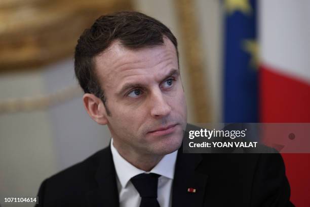 French President Emmanuel Macron meets with representatives of trade unions, employers' organisations and local elected officials at the Elysee...