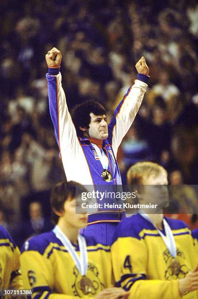 Winter Olympics: USA Men's Ice Hockey captain Mike Eruzione on stand, victorious after receiving gold medal at Olympic Center. Lake Placid, NY...