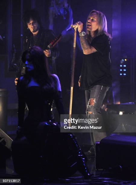 Nikki Sixx and Vince Neil of Motley Crue perform at "The Late Show with David Letterman" to promote their new album "Saints of Los Angeles" and to...