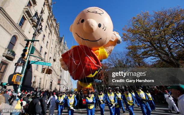 The Charlie Brown balloon floats down Central Park West during the 92nd Annual Macy's Thanksgiving Day Parade on November 22, 2018 in New York City.