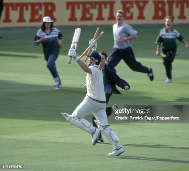 Worcestershire batsman Graeme Hick, 93 not out, runs from the field in celebration after Worcestershire win the NatWest Bank Trophy Final against...