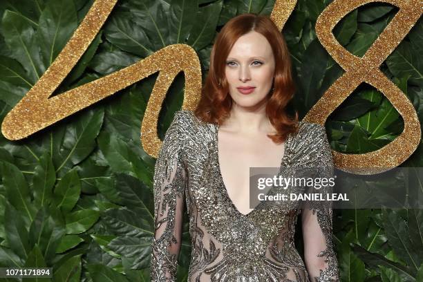 British model Karen Elson poses on the red carpet upon arrival to attend the British Fashion Awards 2018 in London on December 10, 2018. - The...