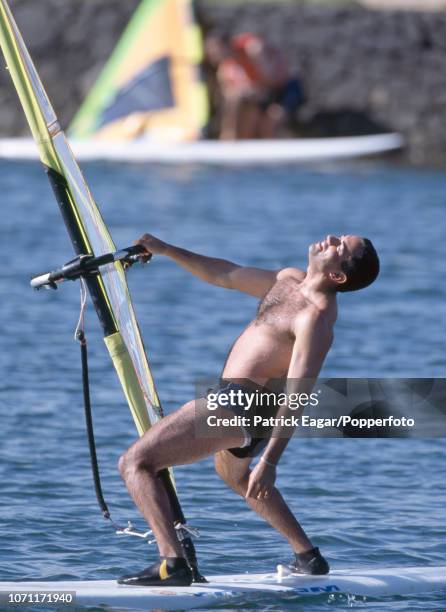 Adam Hollioake of England tries windsurfing during the England training tour in Lanzarote, 9th November 1997.