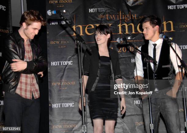 Actor Robert Pattinson, actress Kristen Stewart and actor Taylor Lautner speak at "The Twilight Saga: New Moon" - Cast Tour at Hot Topic on November...