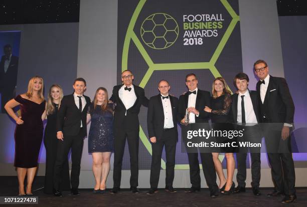 Staff of Manchester United Football Club, Winners of the 'Best Club Marketing Initiative Premiere League' award, on stage with Hayley McQueen and Ed...