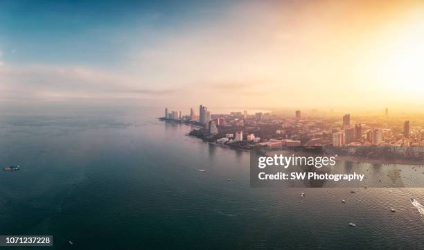 sunrise landscape in pattaya city, thailand - タイ王国　街 ストックフォトと画像