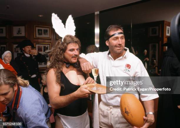 England cricketers Allan Lamb and Graham Gooch in fancy dress for their Christmas Day party in Melbourne, Australia, 25th December 1990.