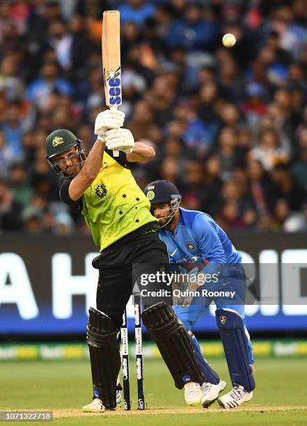 Nathan Coulter-Nile of Australia bats during the International Twenty20 match between Australia and India at Melbourne Cricket Ground on November 23,...