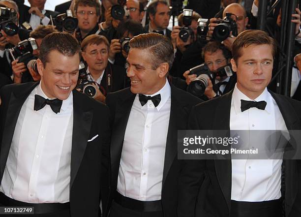 Matt Damon, George Clooney and Brad Pitt during 2007 Cannes Film Festival - "Ocean's Thirteen" Premiere at Palais des Festivals in Cannes, France.
