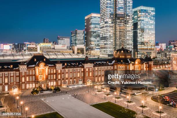 the view of tokyo station and marunouchi at twilight - tokyo station stock pictures, royalty-free photos & images
