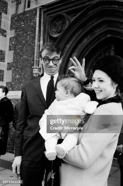 Maxwell, the son of Roy Hudd and his wife Ann, is christened at Croydon Parish Church; Max is pictured with his parents, 28th February 1965.