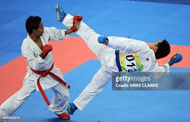 Maharjan of Nepal competes against M F Sanif Haji of Brunei in the men's -60KG karate at the 16th Asian Games in Guangzhou on November 25, 2010. AFP...