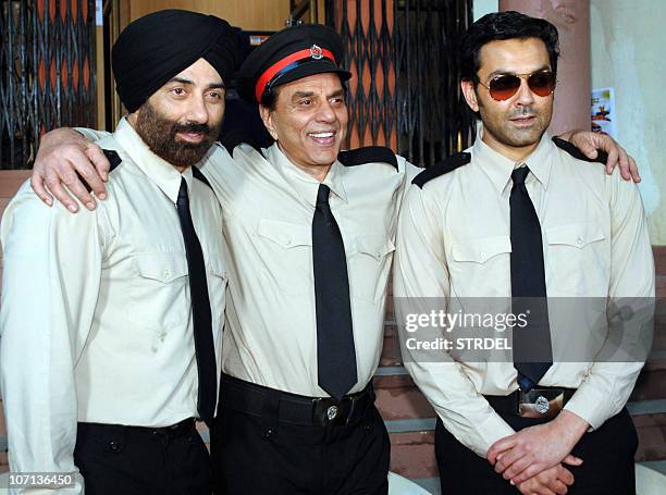 Indian actors Sunny Deol Bobby Deol pose with their father