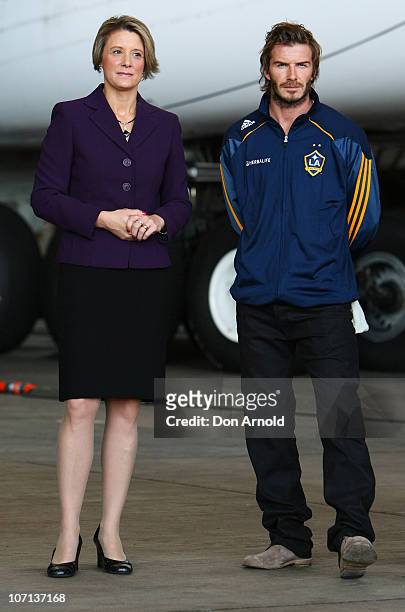 Premier Kristina Keneally stands beside David Beckham upon his arrival at Sydney International Airport on November 25, 2010 in Sydney, Australia.