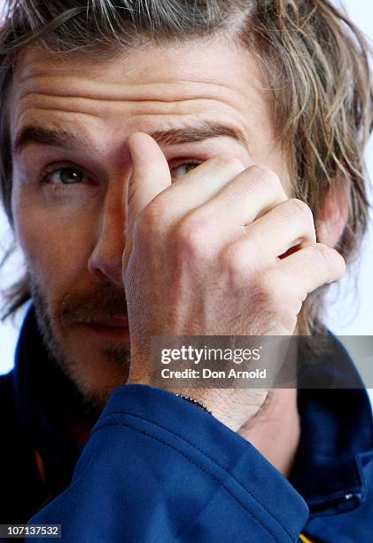 David Beckham answers questions from the media upon arrival at Sydney International Airport on November 25, 2010 in Sydney, Australia.