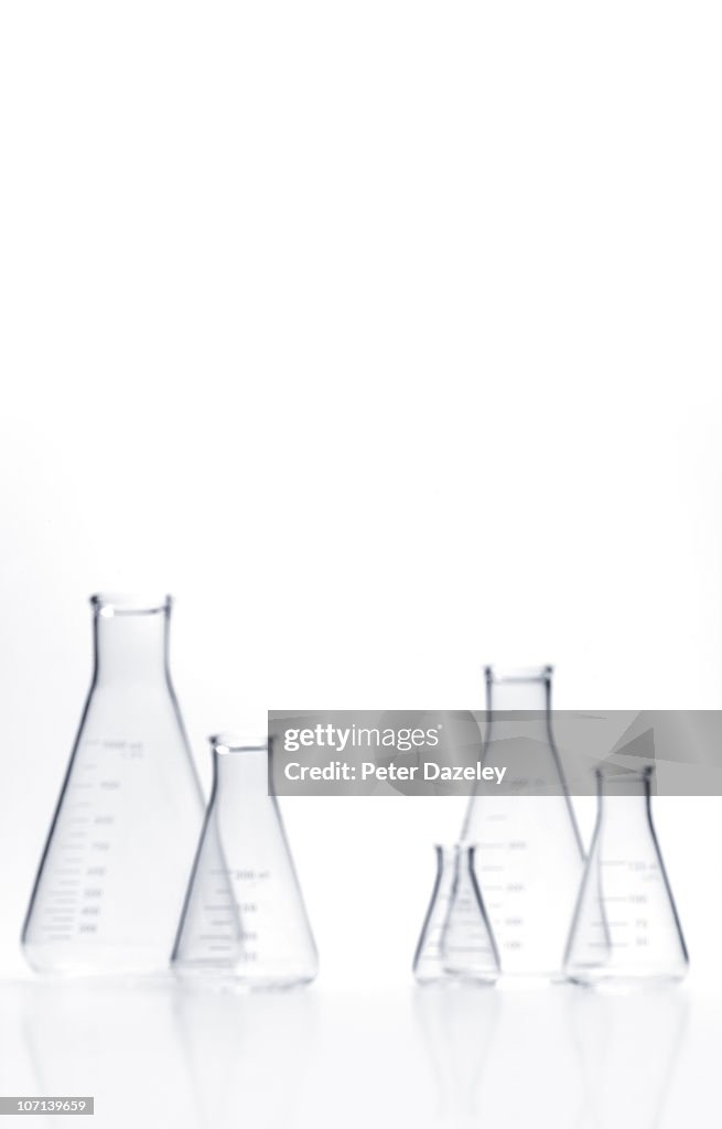 Upright out of focus flasks with copy space
