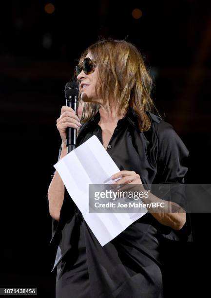 Carine Roitfeld accepts Demna Gvasalia for Balenciaga Accessories Designer Of The Year award during The Fashion Awards 2018 In Partnership With...