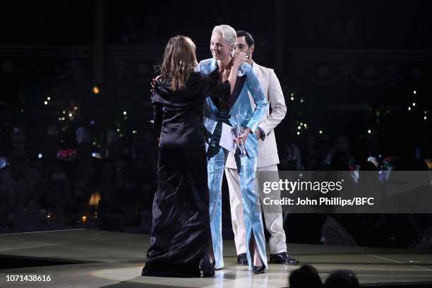 Riz Ahmed and Edie Campbell present Carine Roitfeld with Accessories Designer Of The Year award who is accepting on behalf of Demna Gvasalia for...