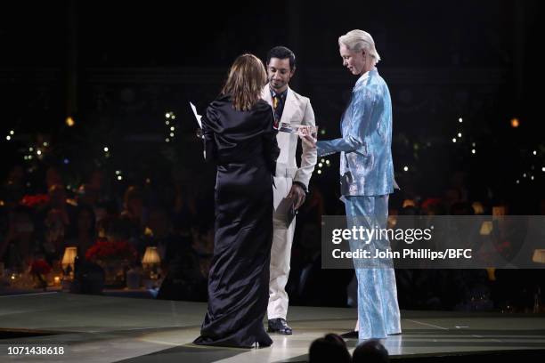 Riz Ahmed and Edie Campbell present Carine Roitfeld with Accessories Designer Of The Year award who is accepting on behalf of Demna Gvasalia for...