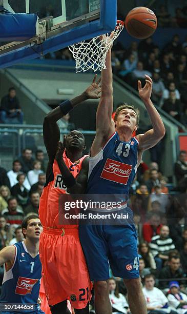 Boniface Ndong, #21 of Regal FC Barcelona competes with Leon Radosevic, #43 of Cibona Zagreb during the 2010-2011 Turkish Airlines Euroleague Regular...