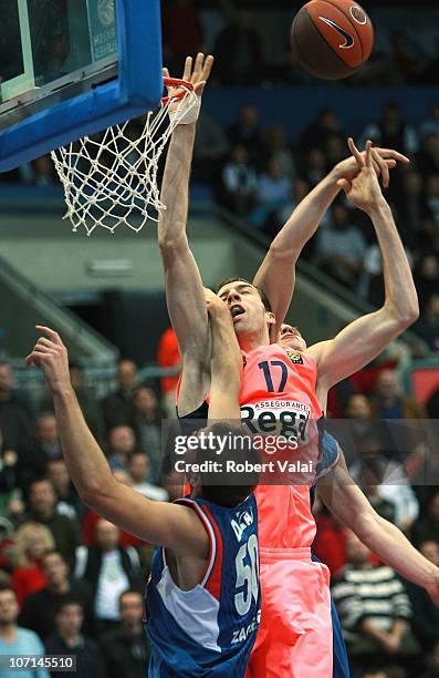 Mario Delas, #50 of Cibona Zagreb competes with Fran Vazquez, #17 of Regal FC Barcelona during the 2010-2011 Turkish Airlines Euroleague Regular...