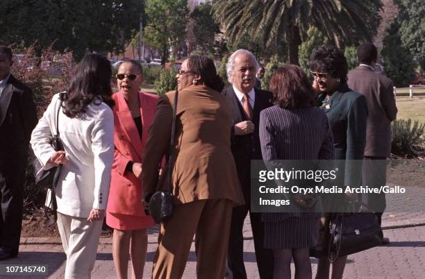 Group of people gathers outside the TRC hearing into the Chris Hani assassination. Hani, head of the South African Communist Party, was killed by...