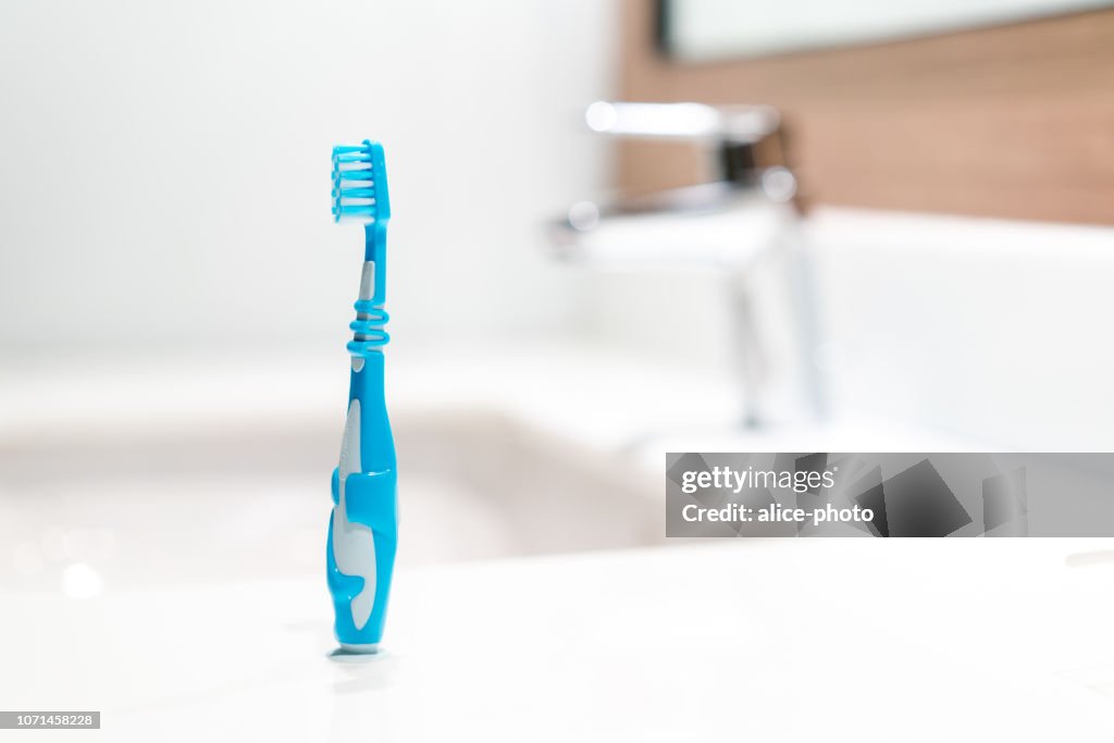 Kid toothbrush in the bathroom