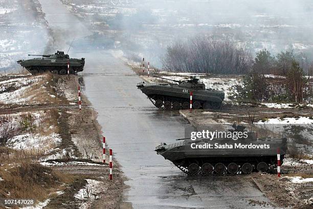 Russian APC's cross the field during Russian Defence Ministry military exercises at the Gorokhovets polygon November 2010 in Mulino, Nizhny Novgorod...