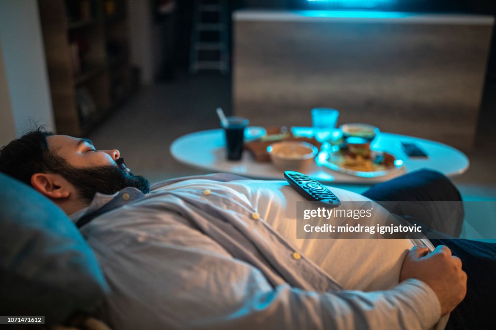 Lazy man fell asleep in living room