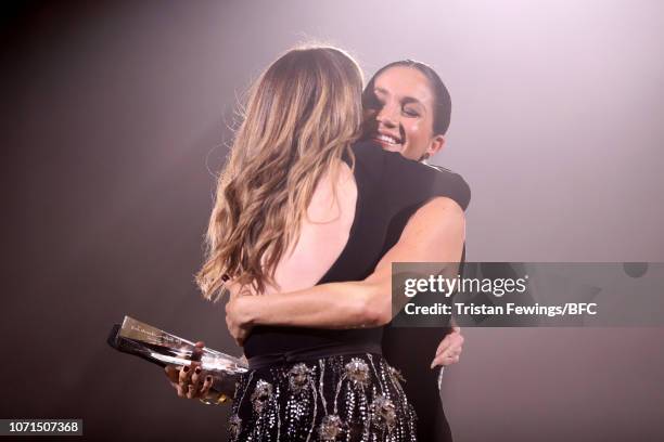 Meghan, Duchess of Sussex presents the award for British Designer of the Year Womenswear Award to Clare Waight Keller for Givenchy during The Fashion...