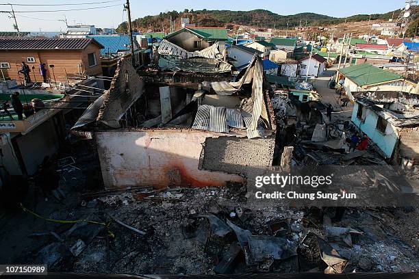 Destroyed houses are pictured following artillery exchange between North and South Korea on November 26, 2010 in Yeonpyeong Island, South Korea....