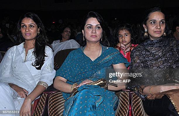 Indian Bollywood actresses Padmini Kolhapure and sisters Tejaswini Kolhapure and Shivangi Kolhapure attend the Divine Felicitations ceremony in...