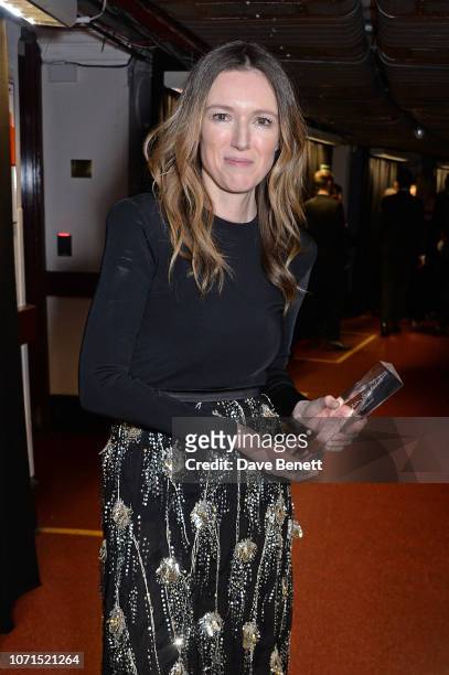 Clare Waight Keller, winner of British Designer of The Year Womenswear award for Givenchy, poses backstage at The Fashion Awards 2018 in partnership...