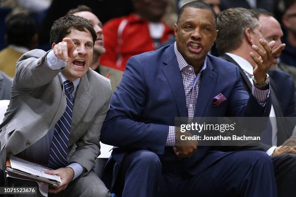 Head coach Alvin Gentry of the New Orleans Pelicans and assistant head coach Darren Erman react during a game at the Smoothie King Center on November...