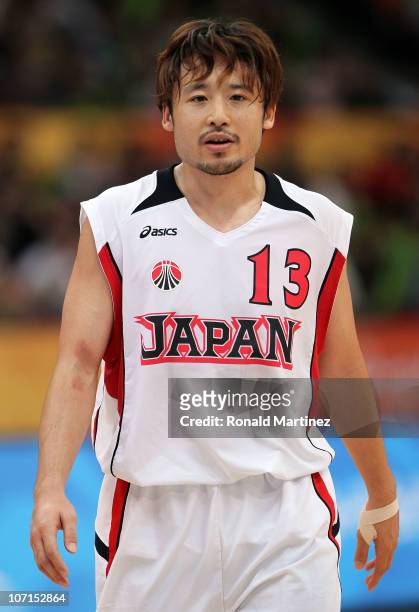 Yuta Tabuse of Japan looks on in the second half against Iran during the men's bronze medal basketball game at the Guangzhou International Sports...