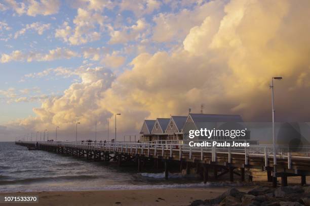 busselton jetty at sunset - busselton jetty stock pictures, royalty-free photos & images