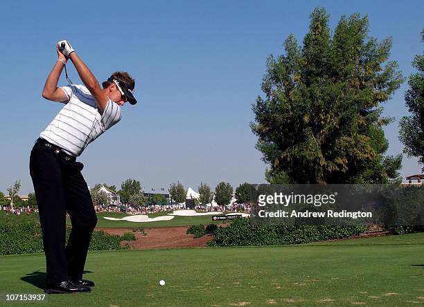 Ian Poulter of England hits his tee-shot on the 13th hole during the second round of the Dubai World Championship on the Earth Course, Jumeirah Golf...