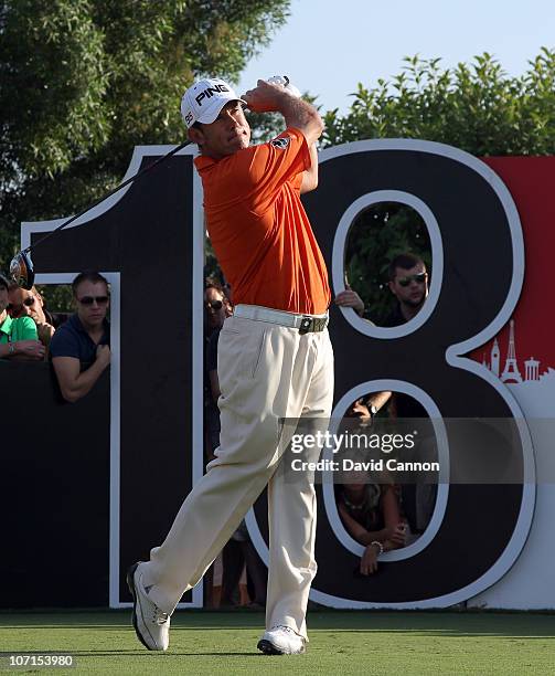 Lee Westwood of England drives at the par 5, 18th hole during the second round of the Dubai World Championship on the Earth Course at Jumeirah Golf...