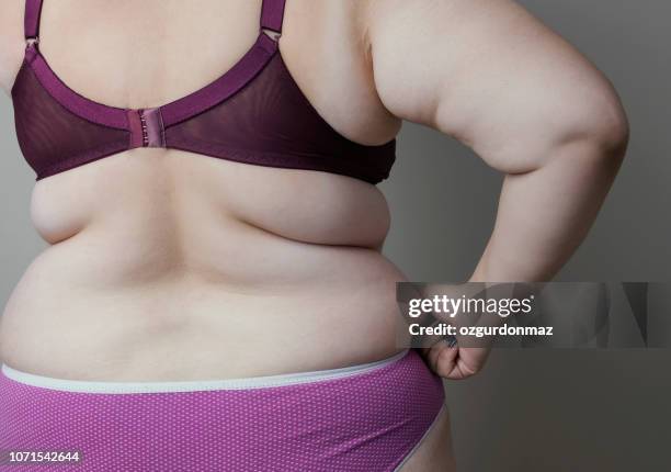 obesity female body - adipose cell stock pictures, royalty-free photos & images