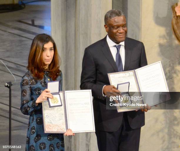 Congolese gynecologist Denis Mukwege and Nadia Murad, a Yazidi human rights activist and victim of war crimes from Iraq, receive the Nobel Peace...